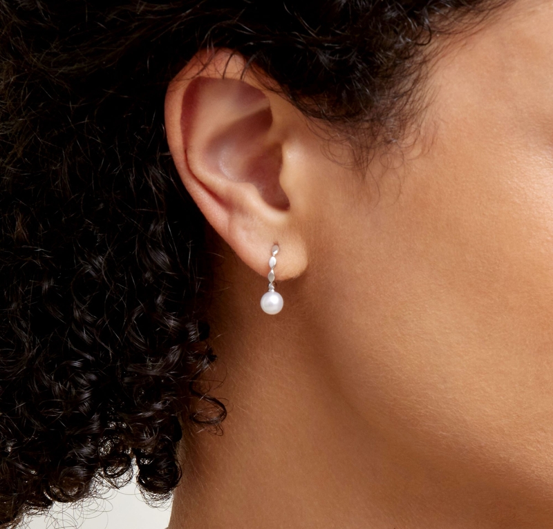 White Akoya Pearl Huggie Macy Earrings - Model Image